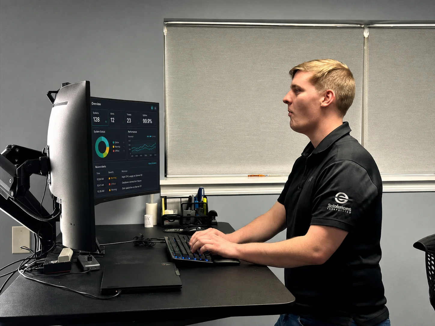 A 3rd Element technician managing a Microsoft 365 tenant at a standing workstation.